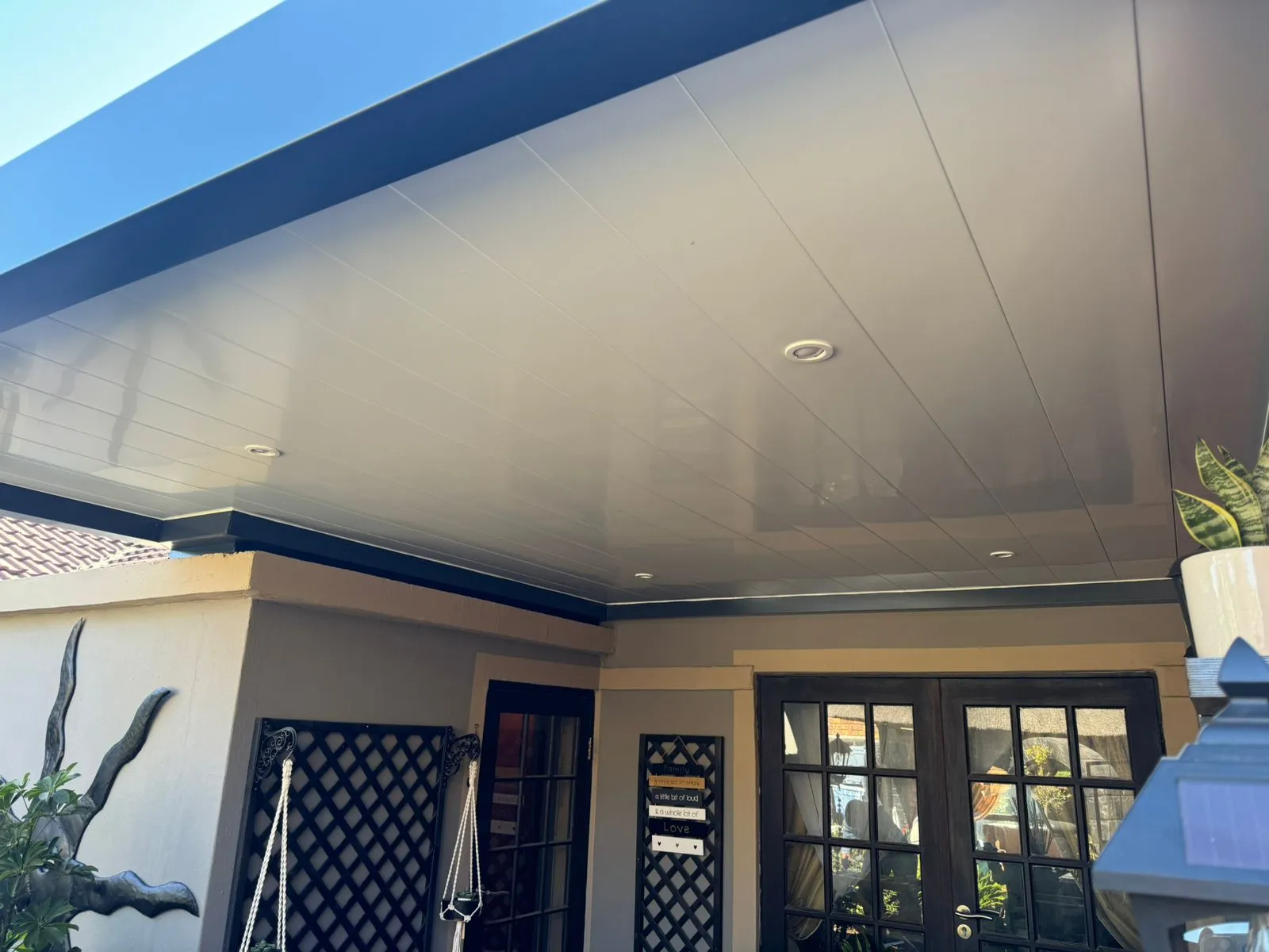 Aluminium patio ceiling with recessed downlights