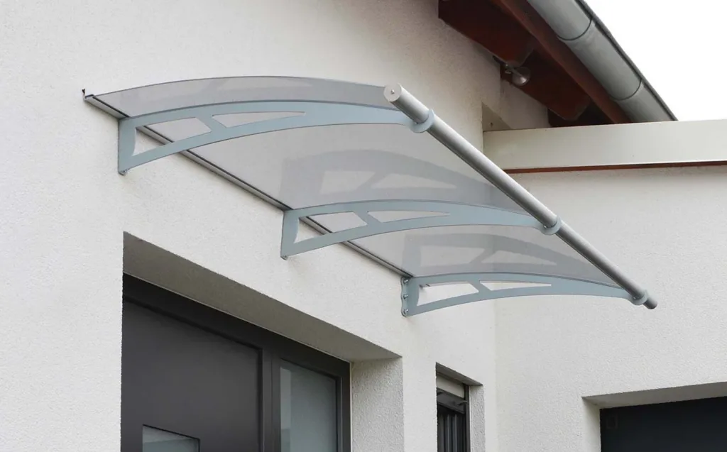 Curved architectural canopy over a modern entrance
