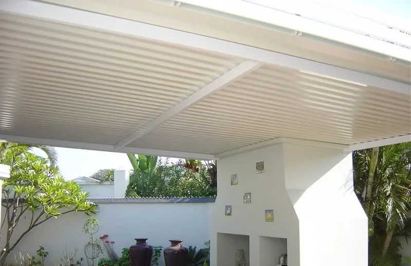 Fixed aluminium IBR patio cover over a braai area
